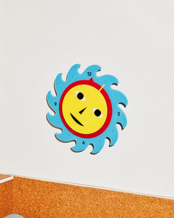 Everybody Clock made in collaboration with Areaware. Made in Yellow, Red and Blue. Battery powered (not included). Recycled acrylic, clock mechanism, plastic. Made in China.