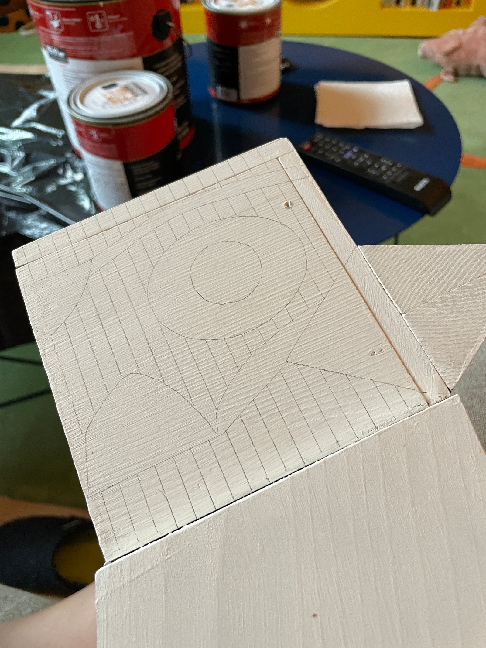 drawing of oodpecker pattern on plain wood