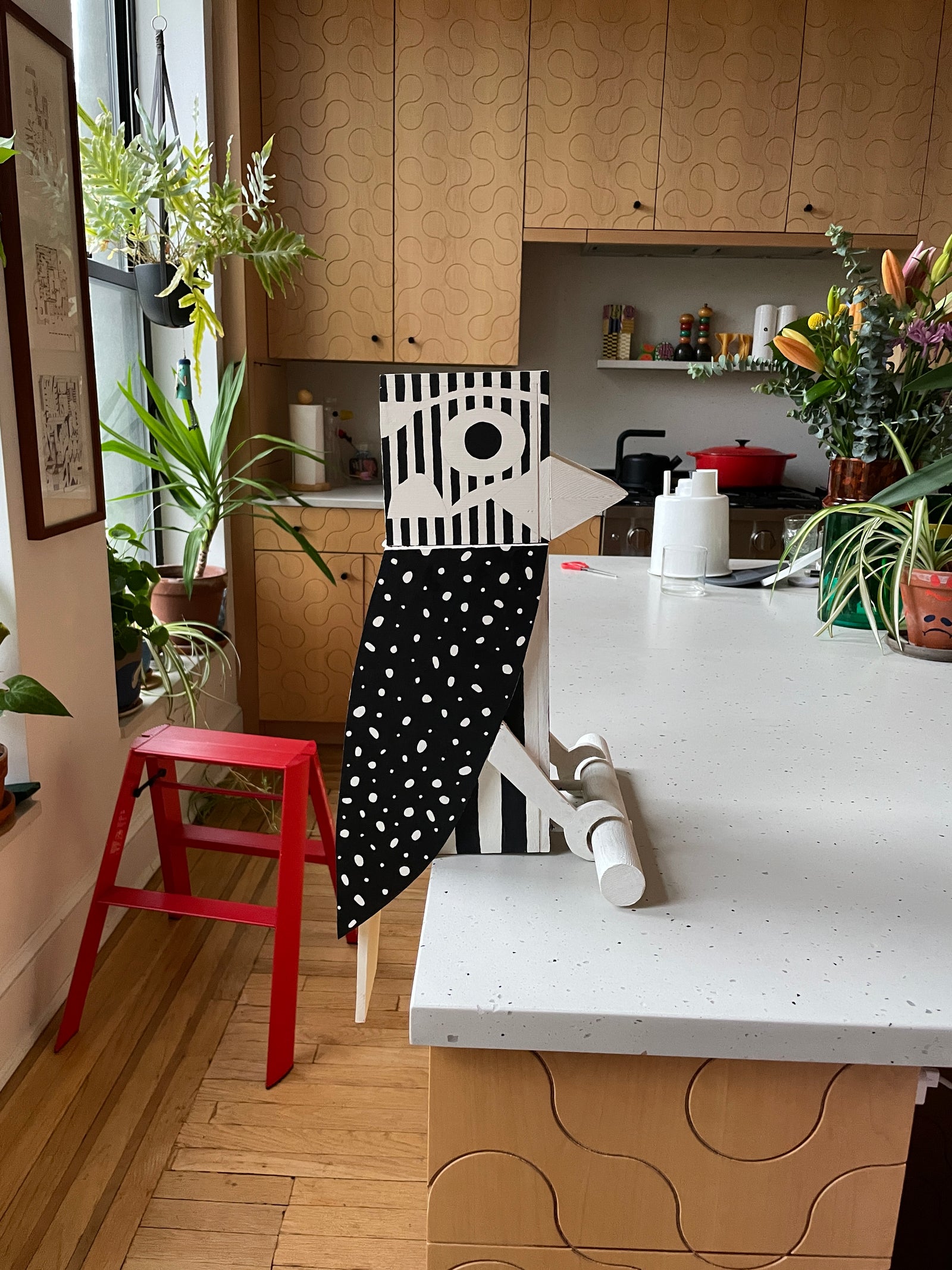 woodpecker birdhouse prototype on kitchen counter