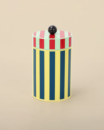 Canister with yellow, blue, red, and green stripes
