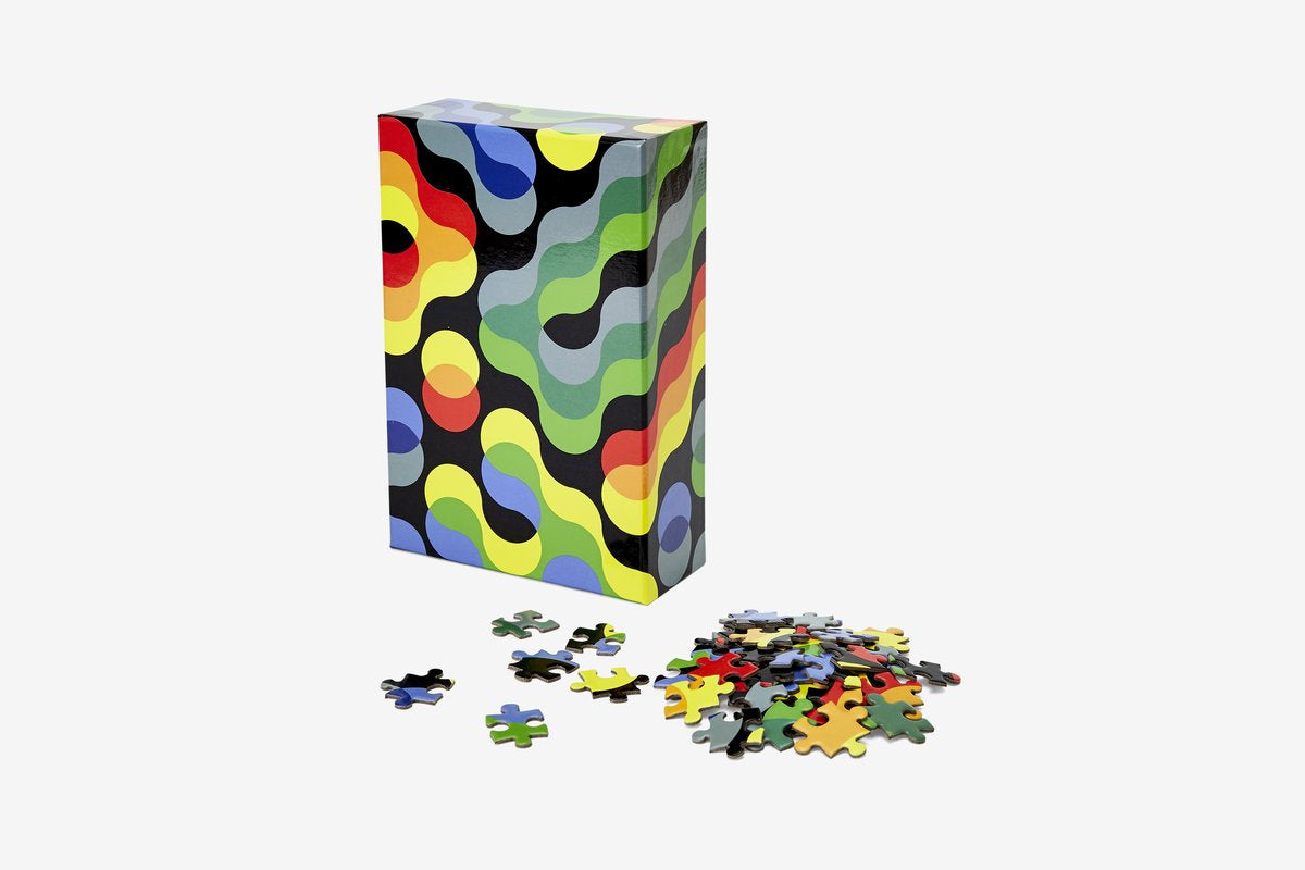 arc puzzle with pieces in pile