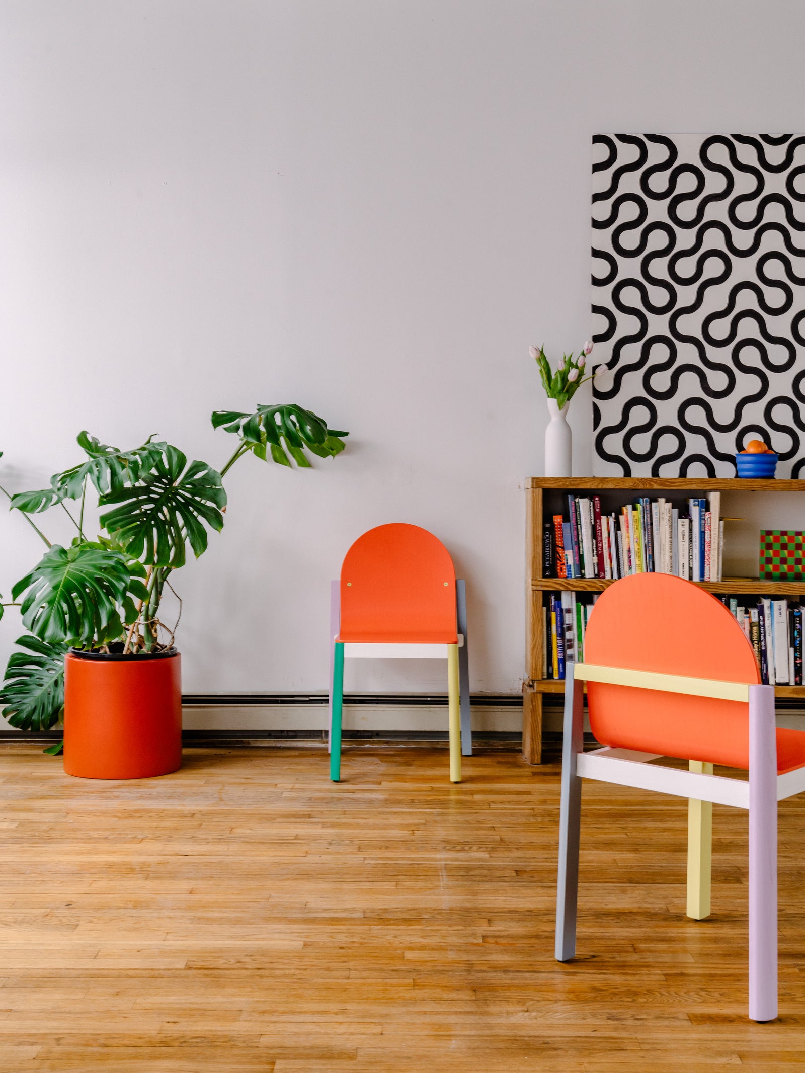 cleo chair from straight on and another in foreground
