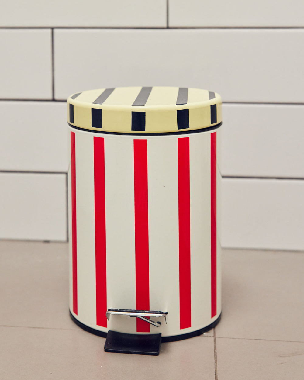 Stucco Trash Bin in tile bathroom