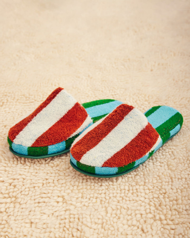 Dusen Dusen Stripe slippers in Field. Contrasting stripes and colorways on the outer shell and plush inner sole. 95% Cotton, 450gsm and 5% Polyamide/Nomex/Meryl. This item is Oeko-Tex Standard 100 certified (no harmful chemicals were used during production). Made in Portugal.