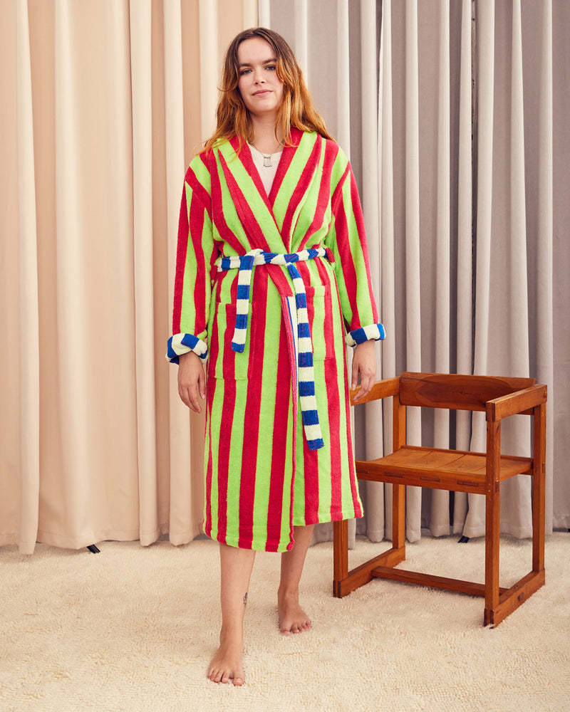 Bathrobe in Garden Stripe. Cotton terry bathrobe with shawl collar, patch pockets, and tie. Contrasting stripes and colorways on both sides. 95% cotton terry, 5% polyamide, 430 GSM. This item is Oeko-Tex Standard 100 certified (no harmful chemicals were used during production). Made in Portugal.
