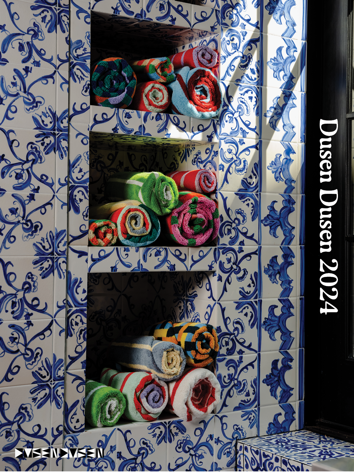 Towels in shelves with Dusen Dusen 2024 written down the side