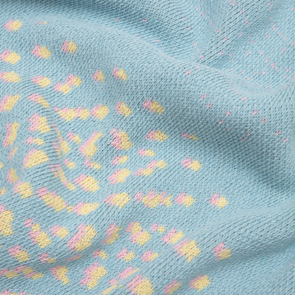 close up on fabric of blue blanket