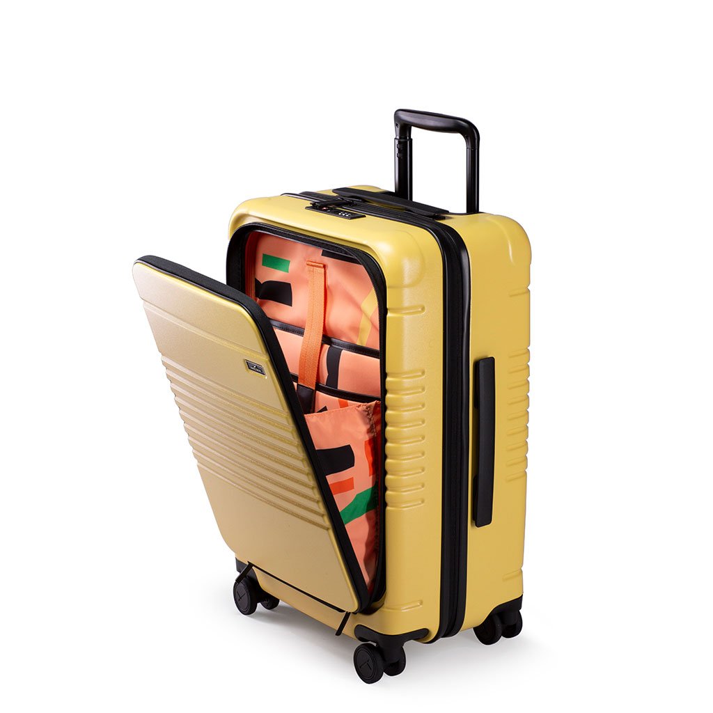 yellow suitcase with front compartment open