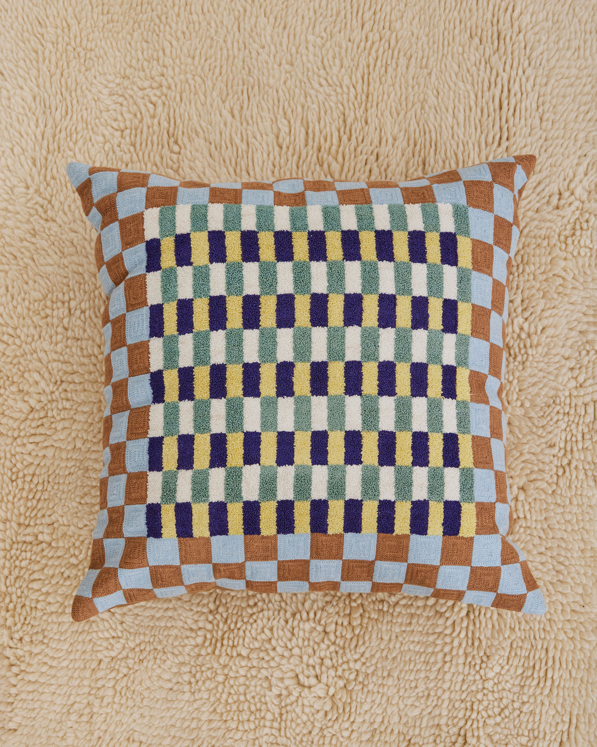 Dusen Dusen Basket Pillow. Basket pillow in multi-color check print. 100% cotton tufted pillow. Natural canvas back with zip closure. Available as 24" x 24". Spot clean only. Made in India.