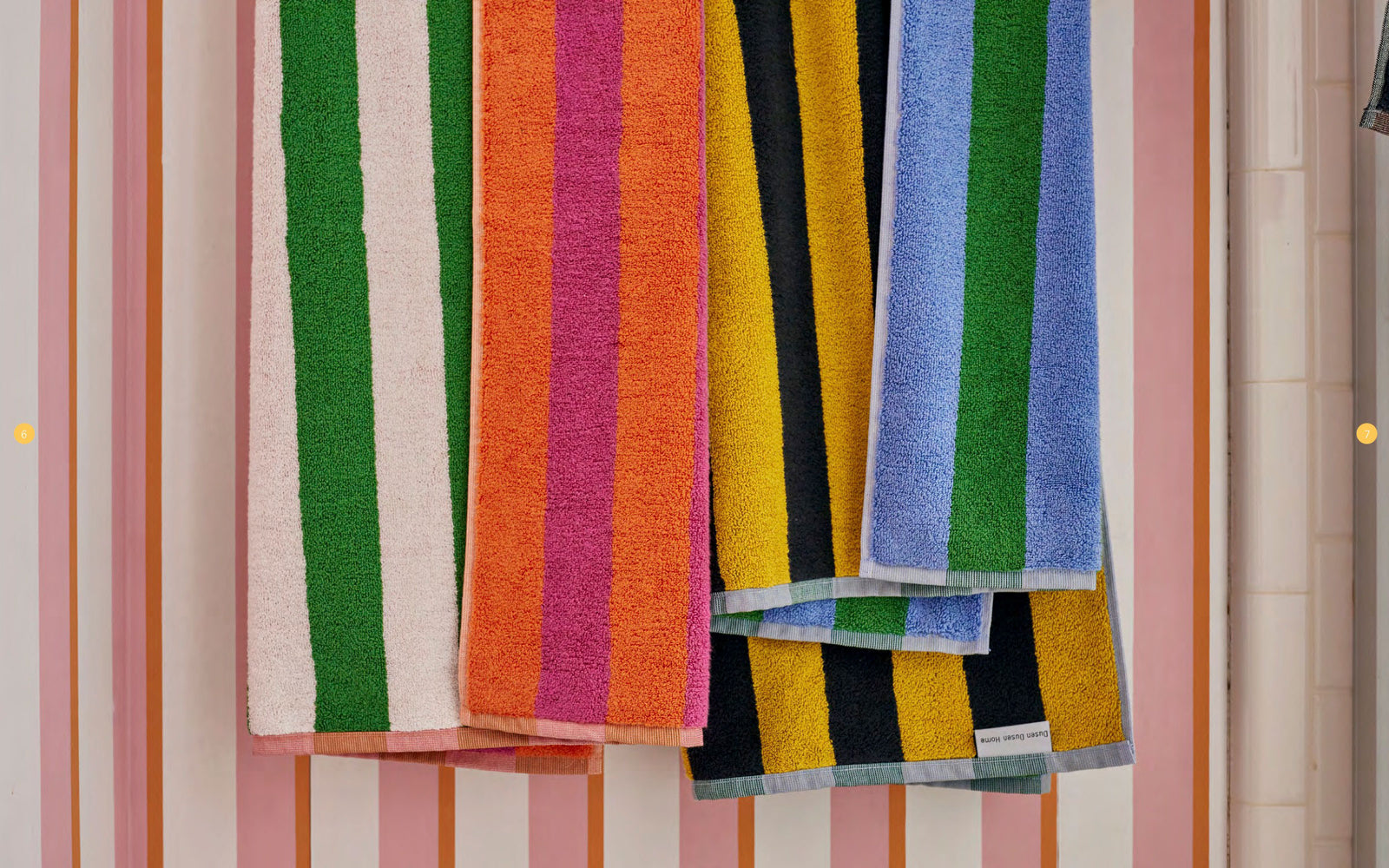 striped towels in front of striped wallpaper