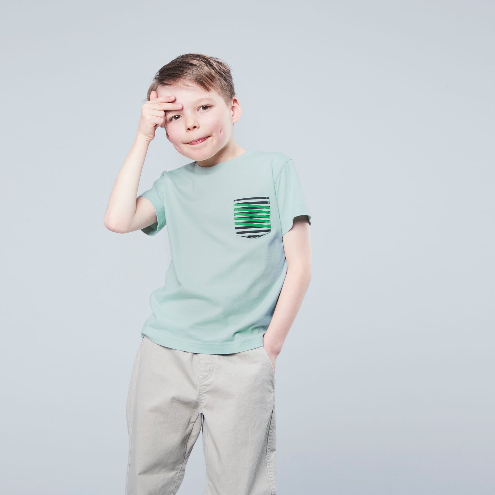 green shirt with pattern stripe detail