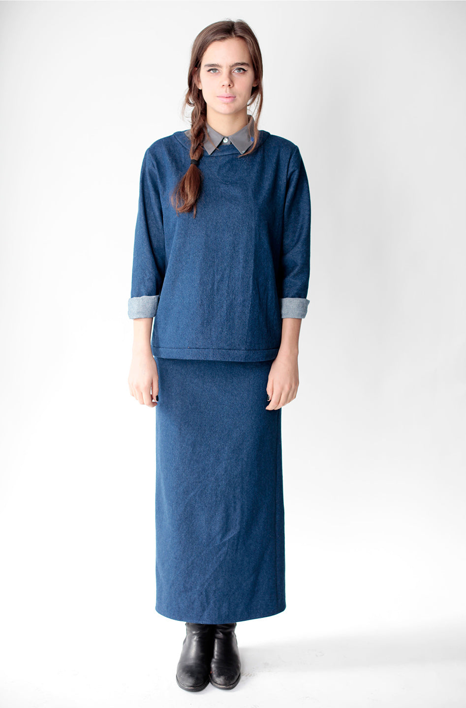 woman in denim blue top and skirt with collar underneath