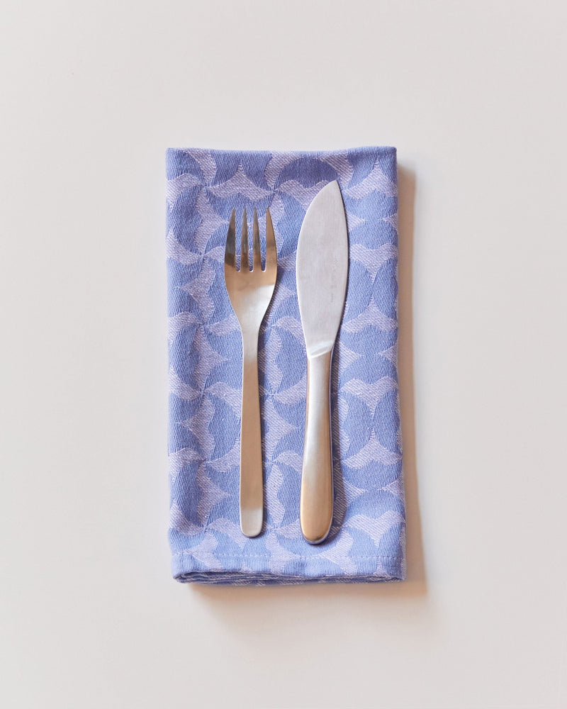 Dusen Dusen blue Flip Pattern Napkins. 100% cotton, jacquard weave, 20"x20". Machine wash cold and tumble dry low. Iron as needed. Made in India.