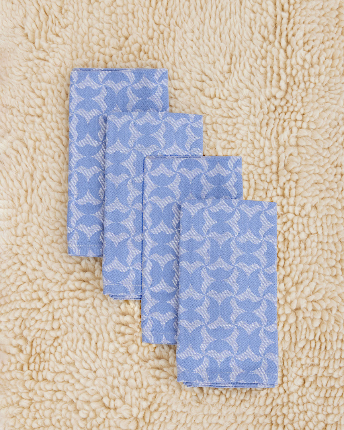 Dusen Dusen blue Flip Pattern Napkins, Set of 4. 100% cotton, jacquard weave, 20"x20". Machine wash cold and tumble dry low. Iron as needed. Made in India.