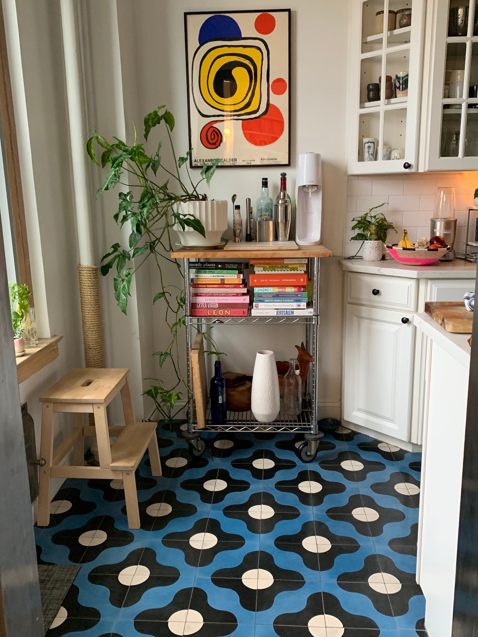 blue and black flower tiles in kitchen