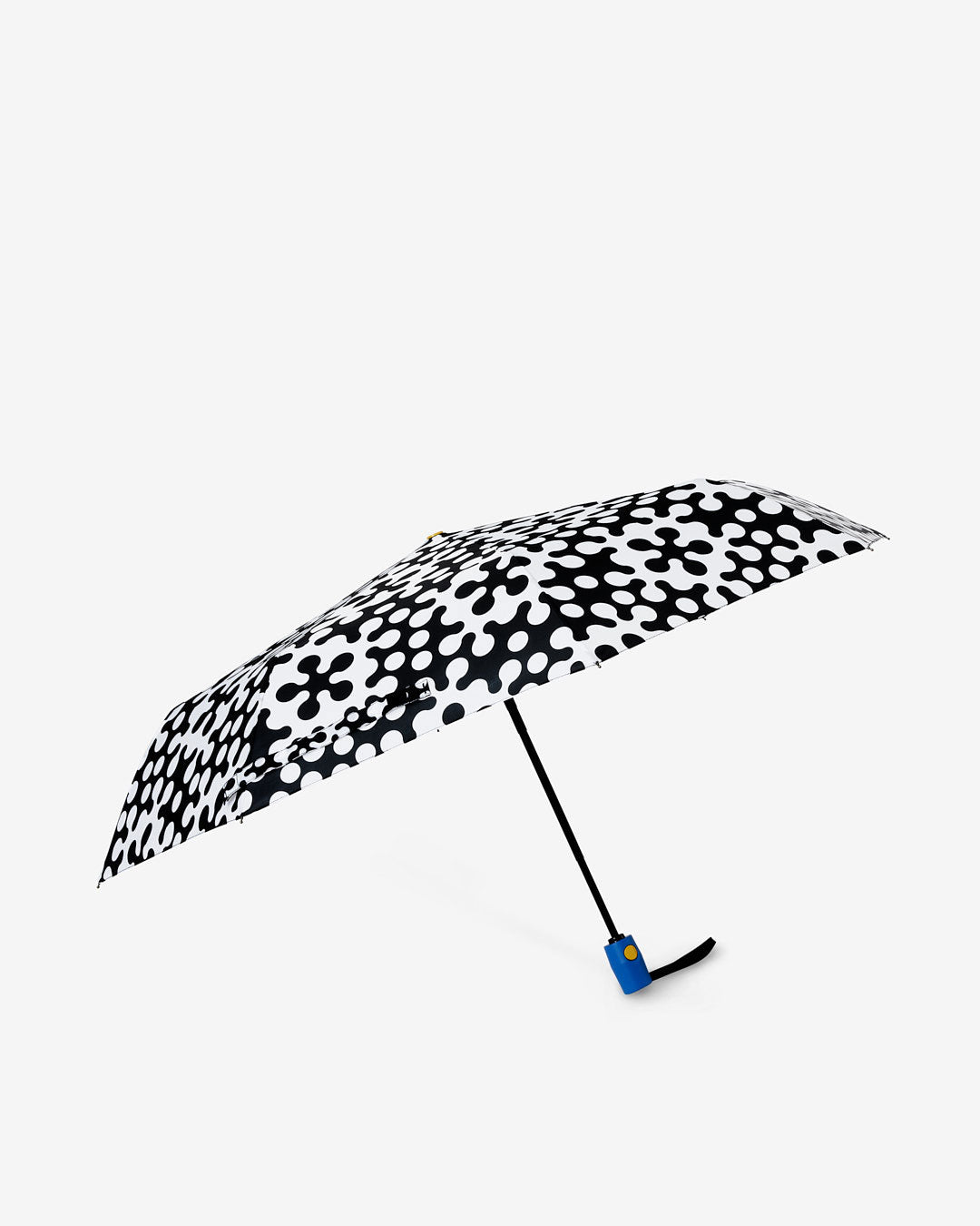 Dusen Dusen for Areaware Pattern Umbrella. Pattern Umbrella made in collaboration with Areaware. Black and white Atom print. Button for automatic opening. Nylon, metal, plastic. Comes with coordinating carrying bag. Made in China.