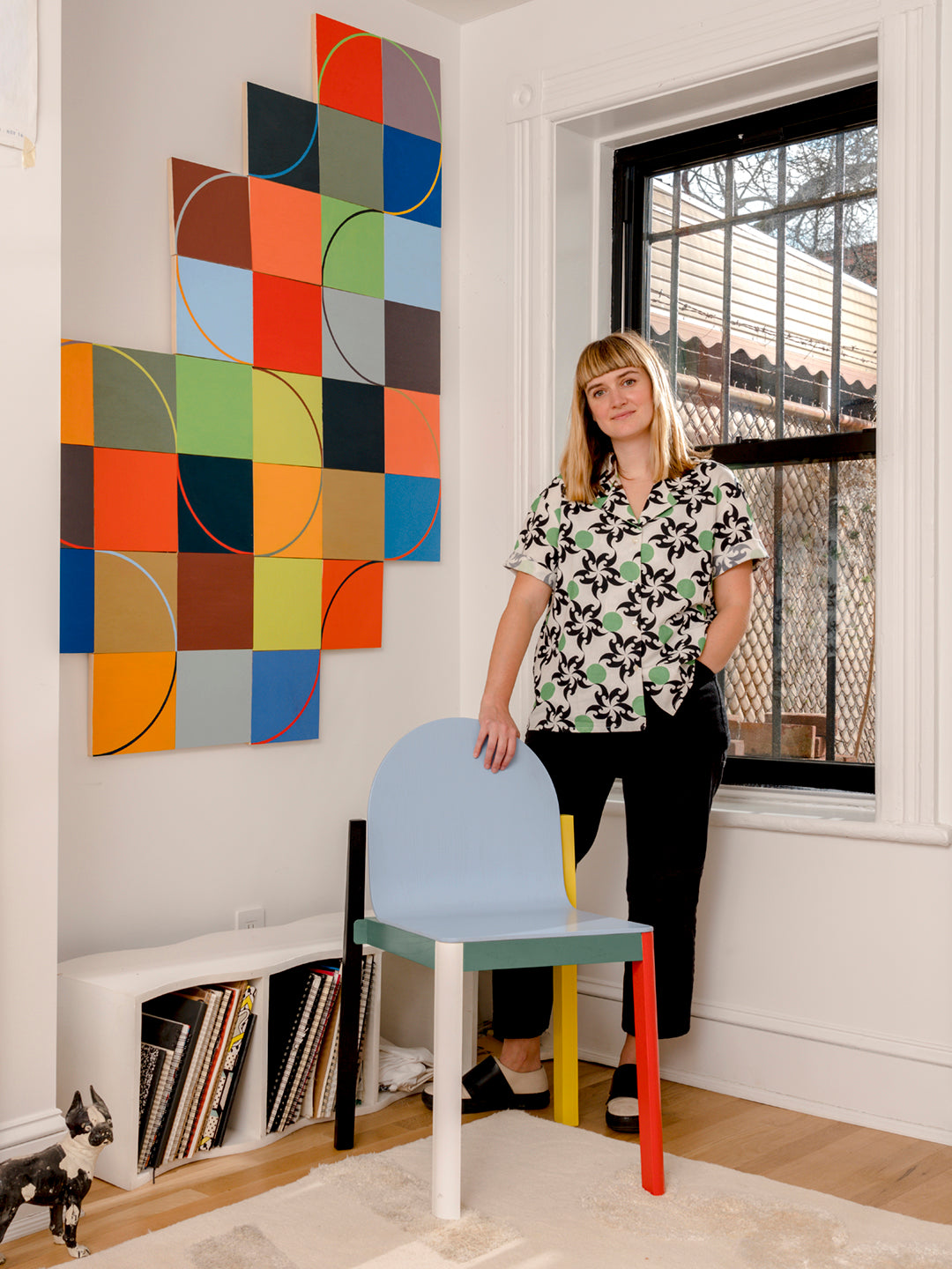 ellen with cleo chair by window