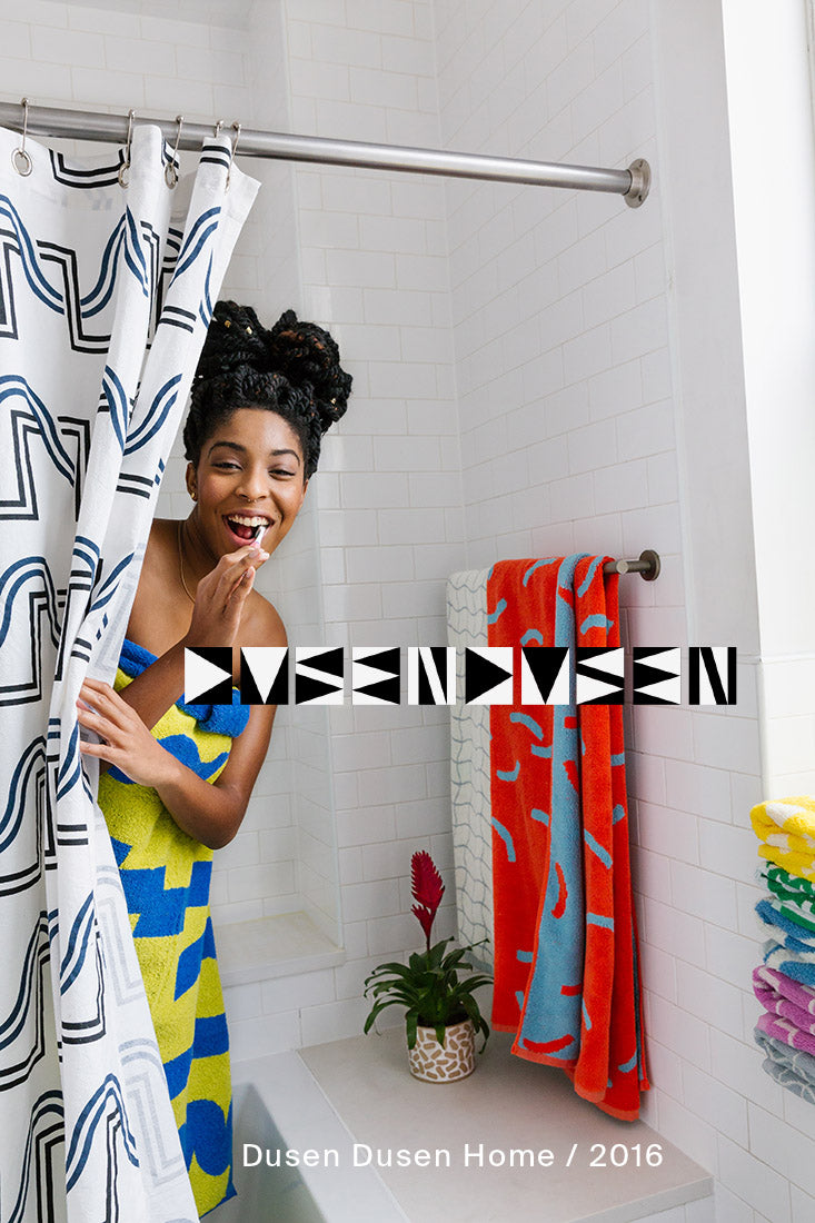 Jessica williams in shower and dusen dusen logo overlaid