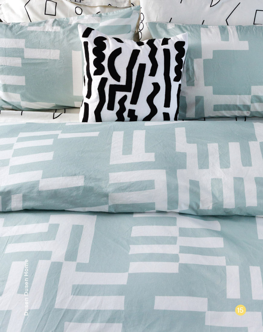 grey blue duvet cover and black and white pillow