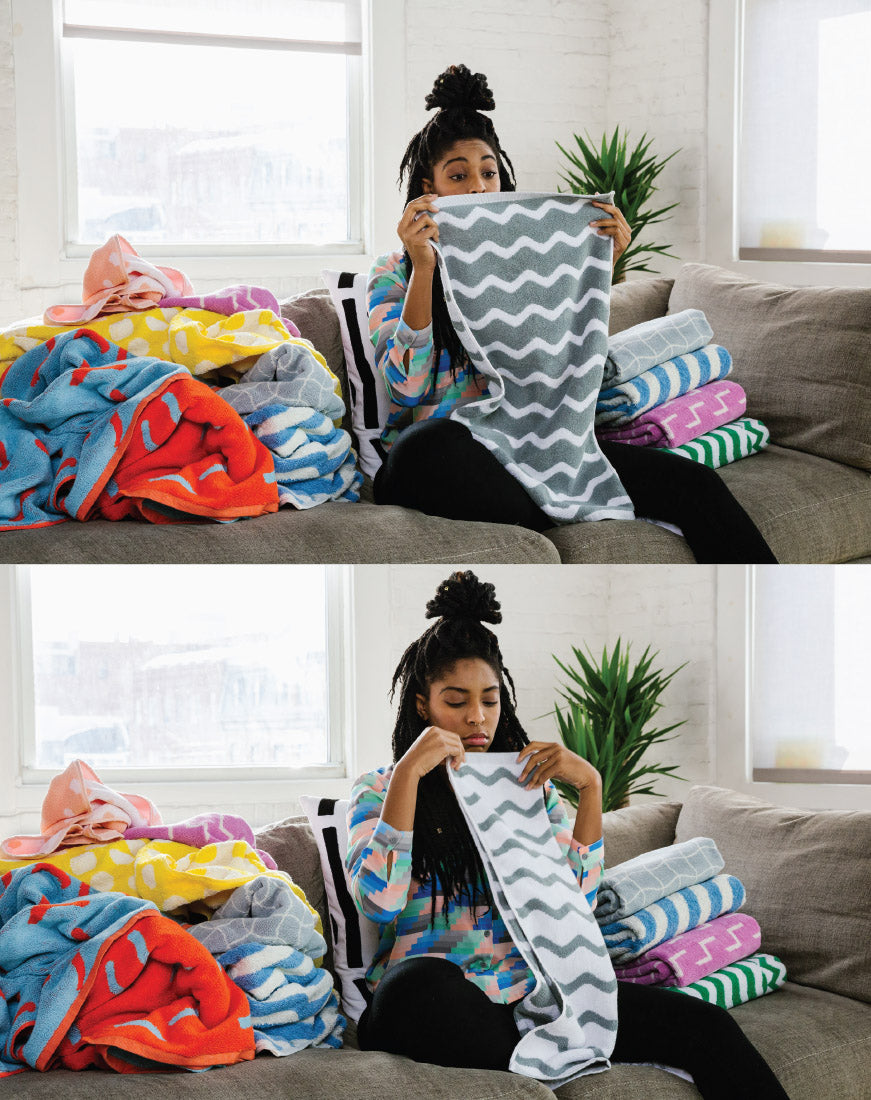 jessica williams folding towels on couch