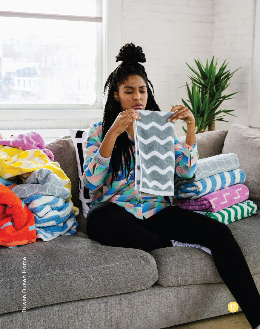 jessica williams on couch with mulicolored towels