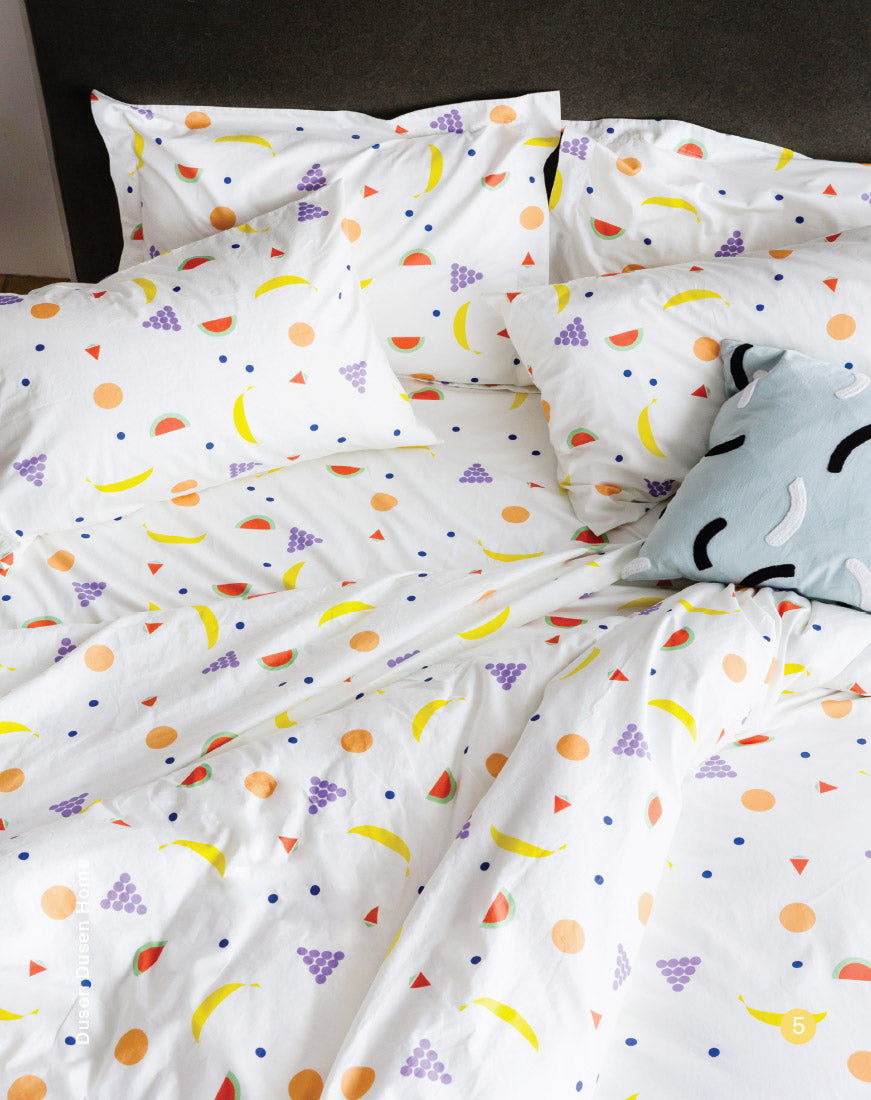 fruit sheets with blue pillow