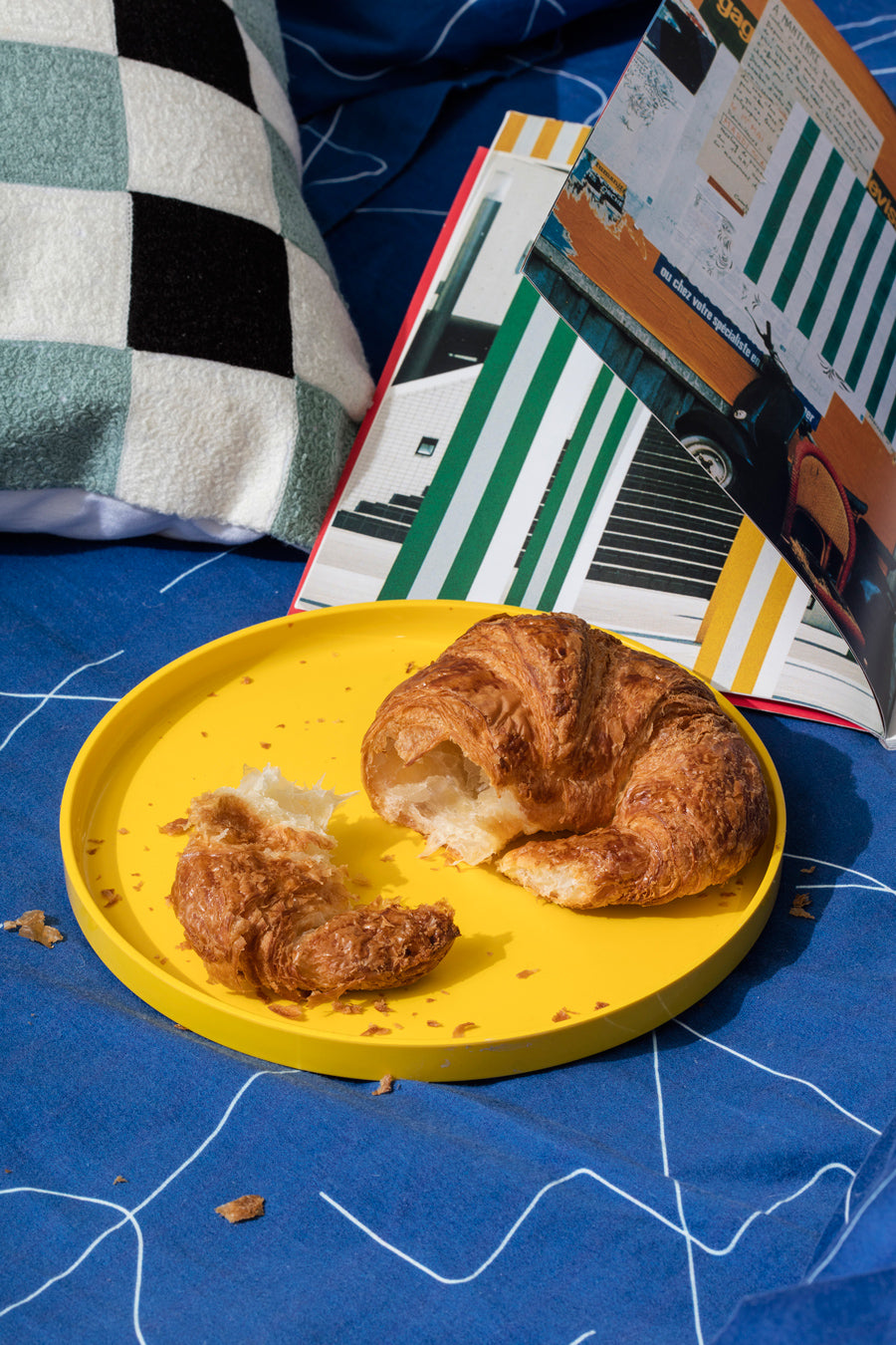 croissant on yellow plate