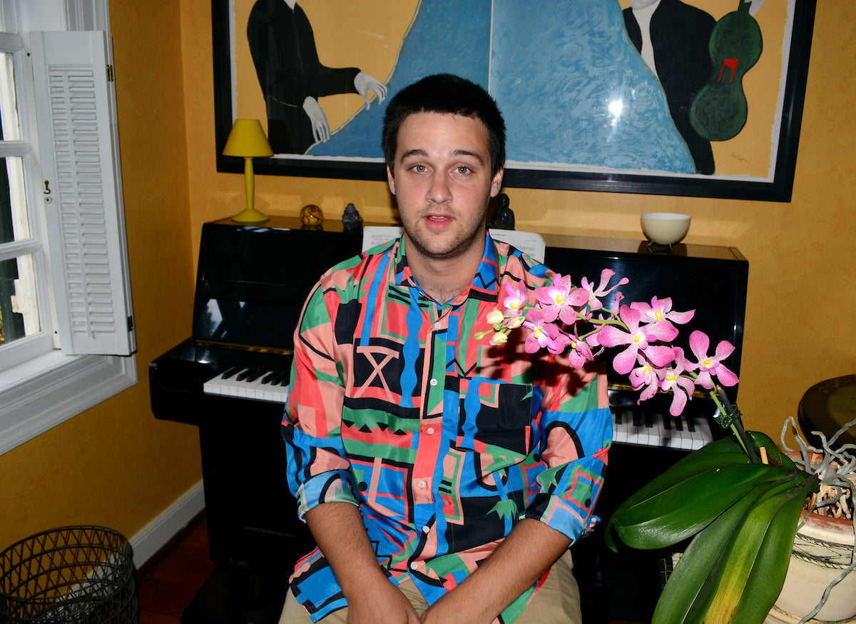 henry in pattern button up at piano