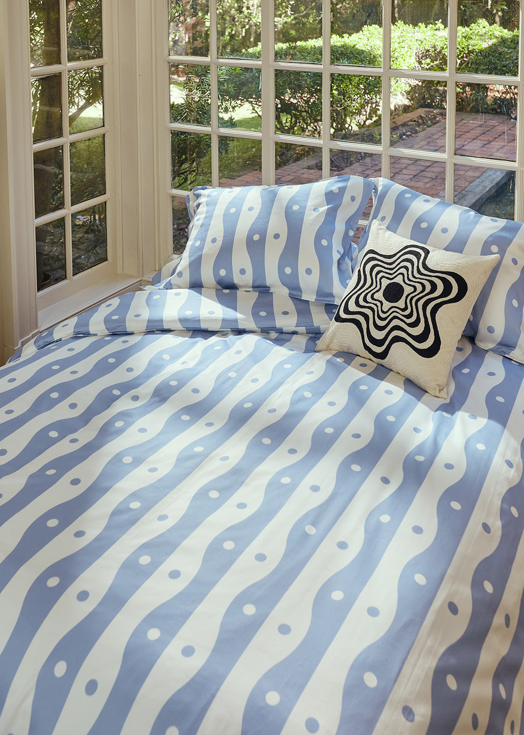 Dusen Dusen Duvet and Sheet Sets in blue and white River print. Include an individual Flat Sheet to round out a Sheet Set. 100% cotton sateen, 300 thread count. Machine wash cold and tumble dry. Made in Portugal;