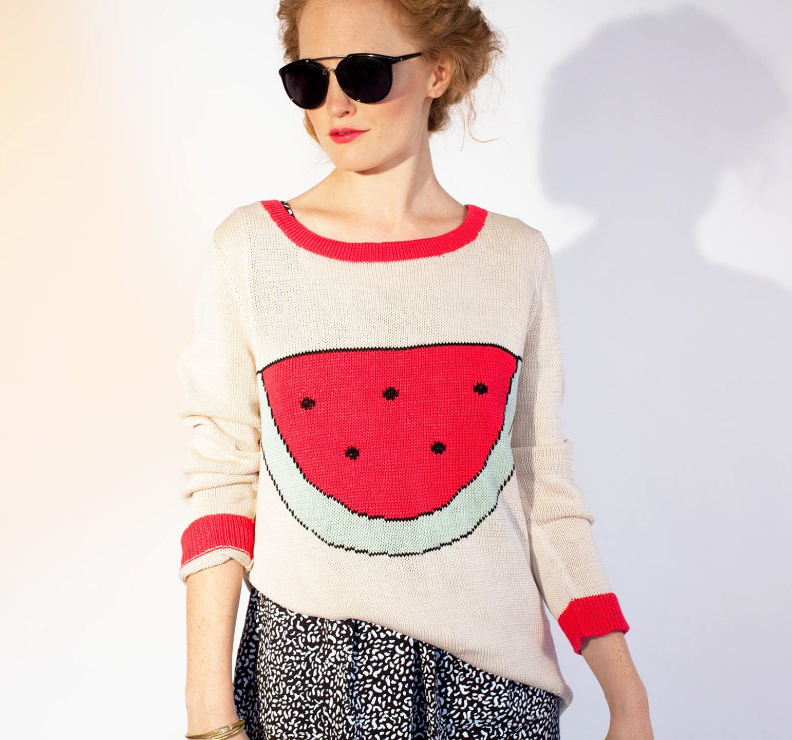 woman in watermelon sweatshirt