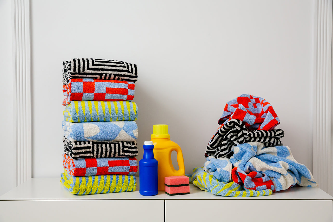 colorful towels on bench
