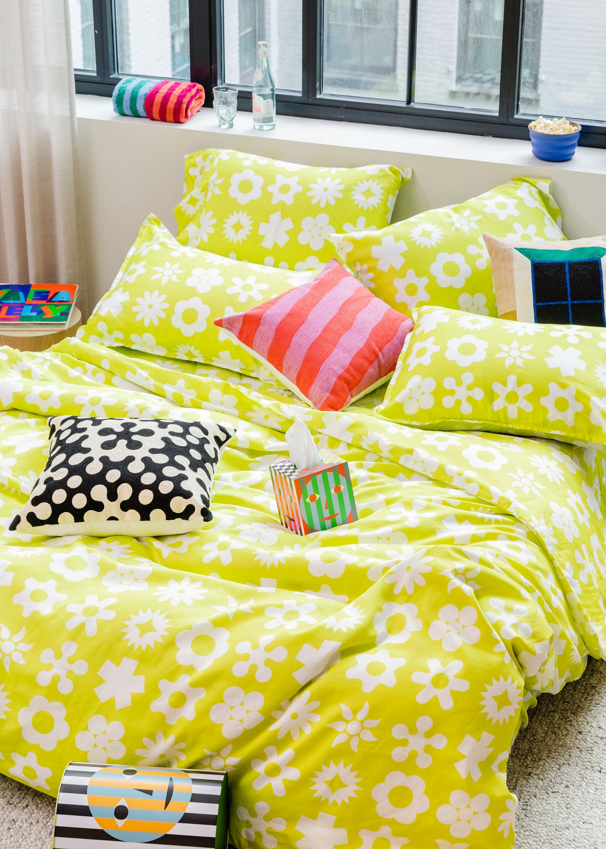 Dusen Dusen Yellow Wingding Duvet and Sheet Sets in chartreuse and white Wingdings print. Include an individual Flat Sheet to round out a Sheet Set. 100% cotton sateen, 300 thread count. Machine wash cold and tumble dry. Made in Portugal. Our cotton sateen is smooth and cool to the touch and features a slightly lustrous finish. The sateen softens further with every wash;