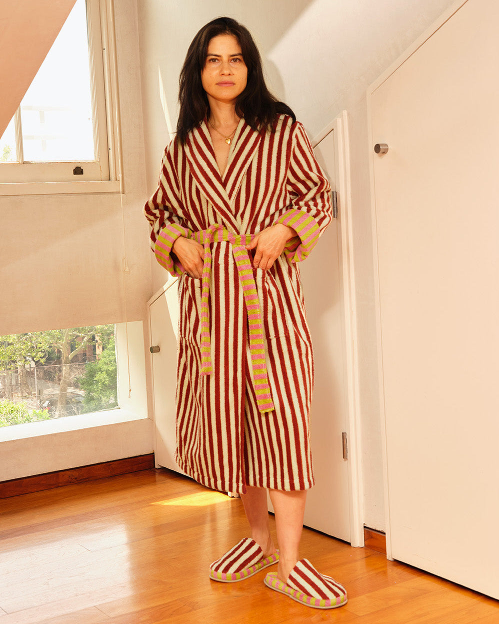 Ana in a caterpillar bathrobe and slippers 