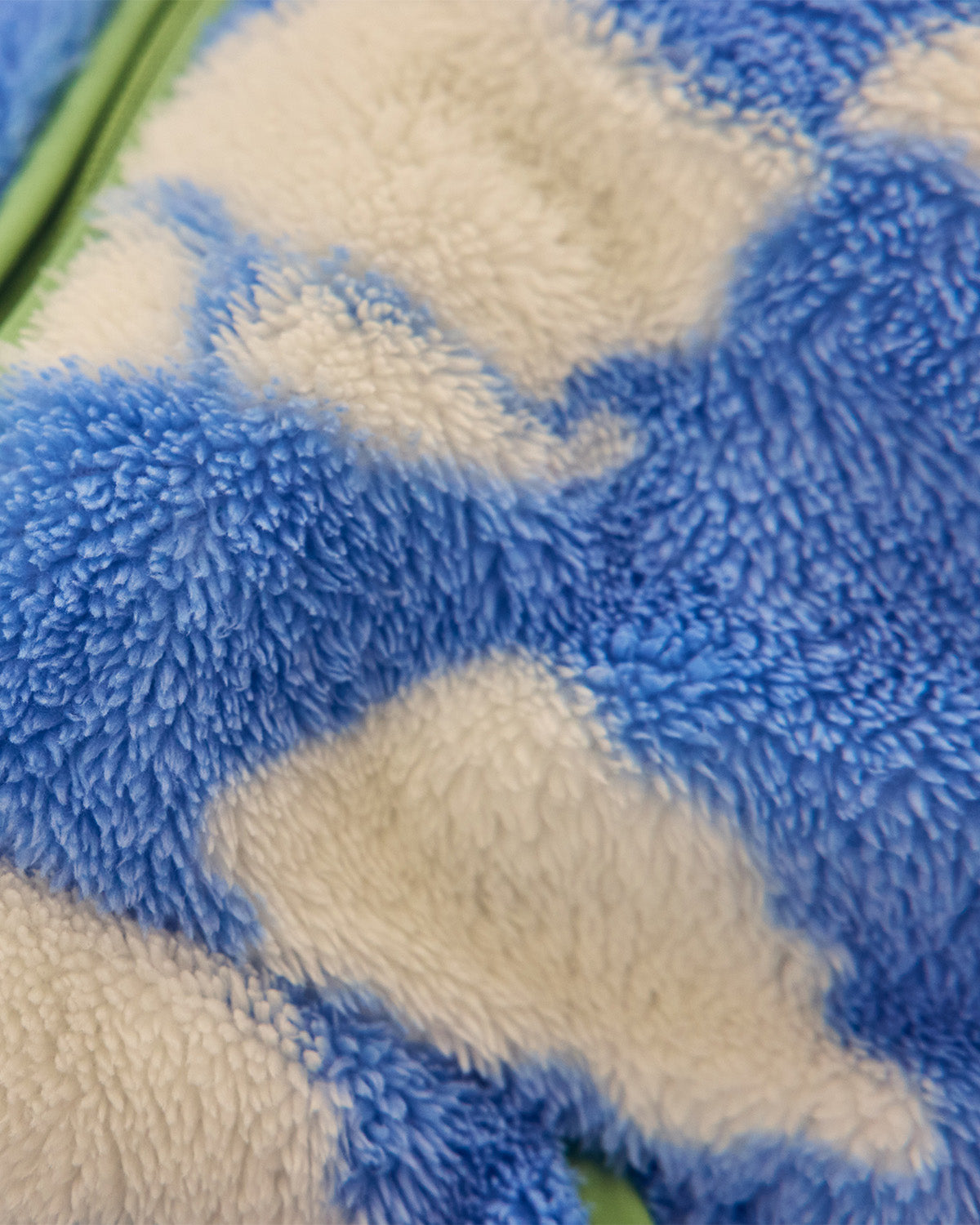close up of blue and white fleece in cloud pattern