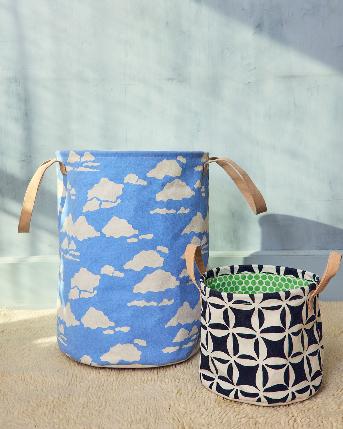 Two fabric baskets with handles