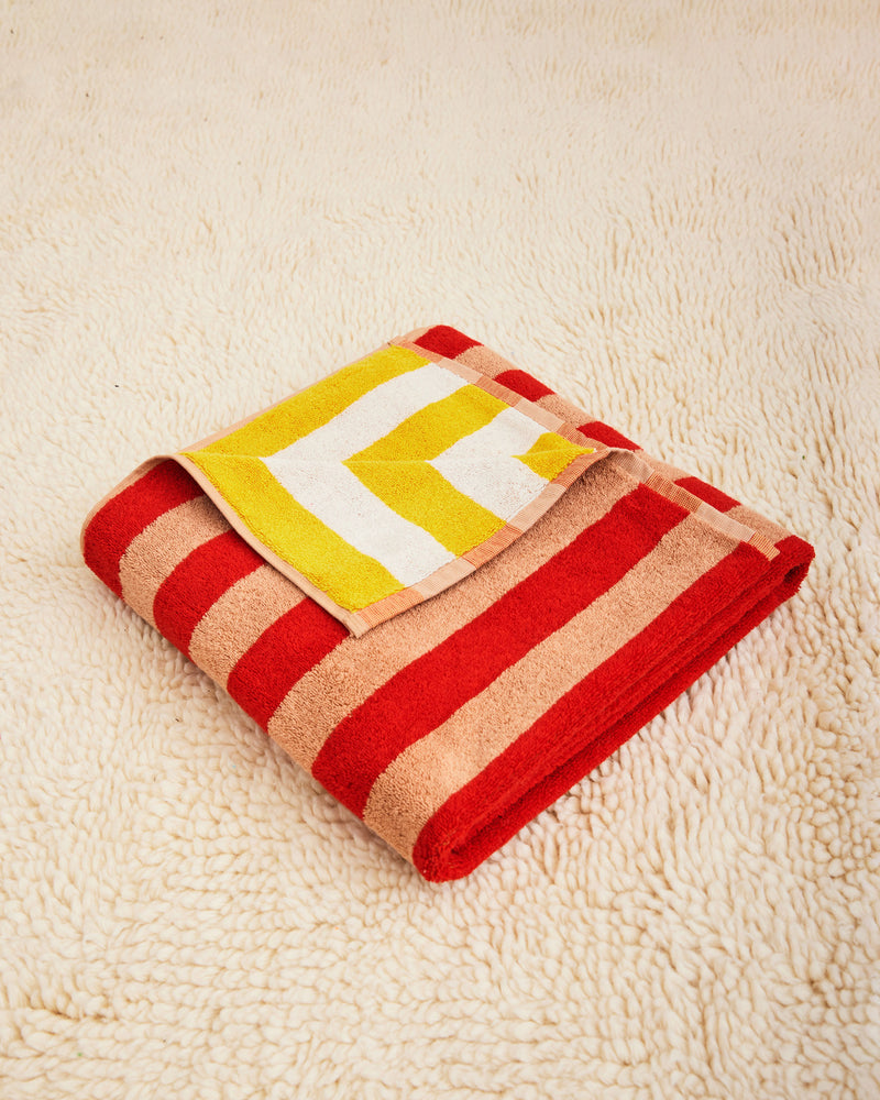 Dusen Dusen Earth Stripe Towels. 100% brushed cotton terry, 700 GSM, reversible striped colorways. Bath towel: 30"x56". Hand towel: 20"x 30". Washcloth: 12"x12". Made in Turkey.