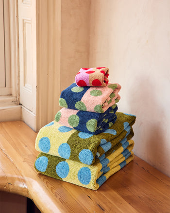 ["Stack of colorful polka dot towels on a wooden surface. ", " Oh you know a Spot? I know 5. They are my towels. <br> <br> Set of 5 includes\n2x Blue Dot Bath Towels, \n2x Green Dot Hand Towels, and\n1x Red Dot Washcloth"]