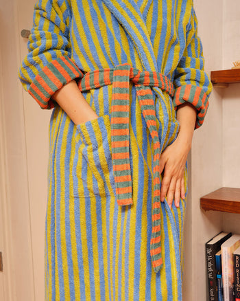 ["A person wearing a plush bathrobe with vertical stripes in blue, chartreuse, green, and orange, standing indoors next to a bookshelf.  ", " Boi-oi-oi-ng! <br> <br> Ana is 5'5\" and wears a size S, Jessica is 5'6\" and wears a size S, Jesse is 6'1\" and wears a size L "]