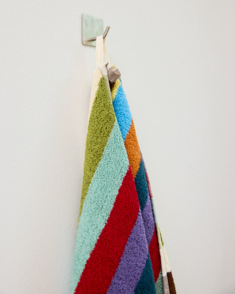 Hummingbird bath towel close up of hanging loop