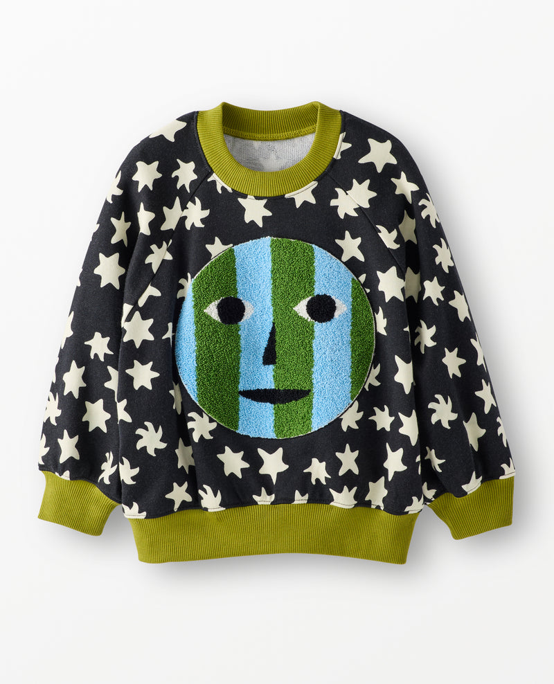 sweatshirt on white background with stars and green cuffs with applique face