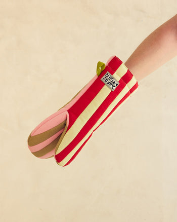 red and light green striped oven mitt with hand 