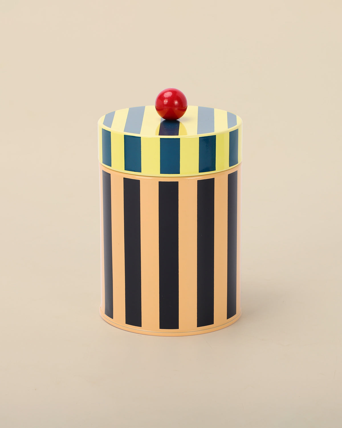Striped canister in beige, black, blue and yellow