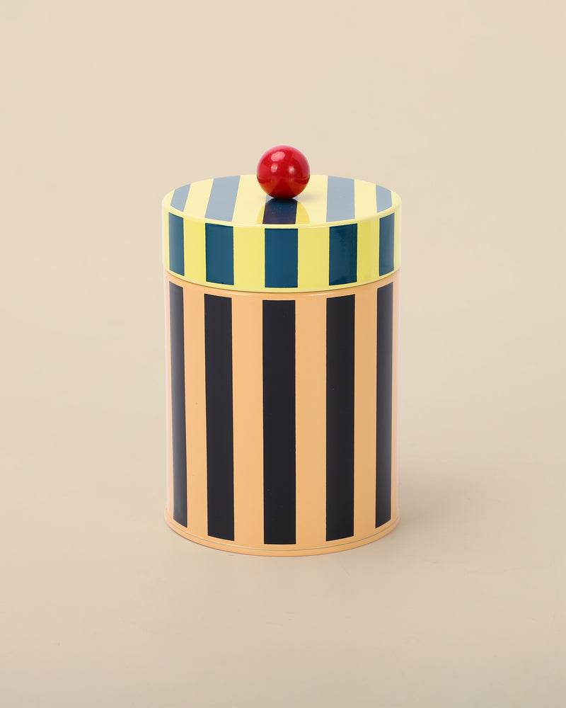 Striped canister in beige, black, blue and yellow