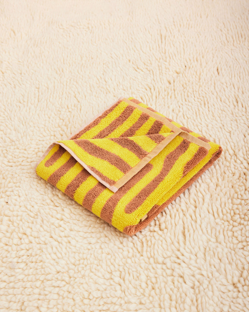Dusen Dusen Oak Hand Towel. 100% brushed cotton terry, 700 GSM, in a trio of patterns. Bath towel: 30"x56". Hand towel: 20"x 30". Washcloth: 12"x12". Made in Portugal.
