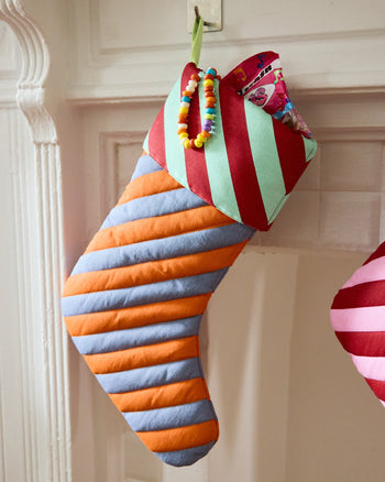 pumpernickel stocking in orange, grey, light green and red