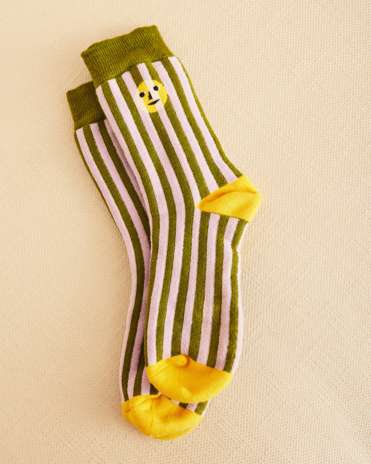Sea stripe socks on a beige background