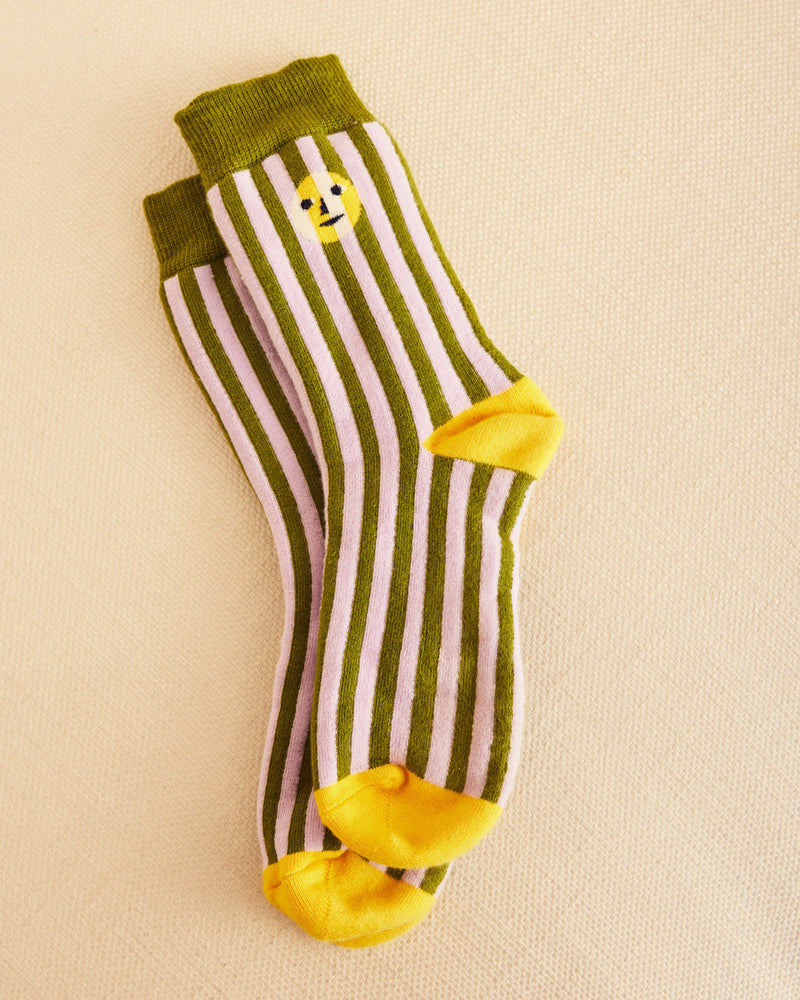 Sea stripe socks on a beige background