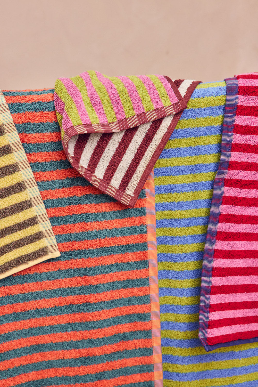 Bug stripe 2026 stripe towels on wooden rail