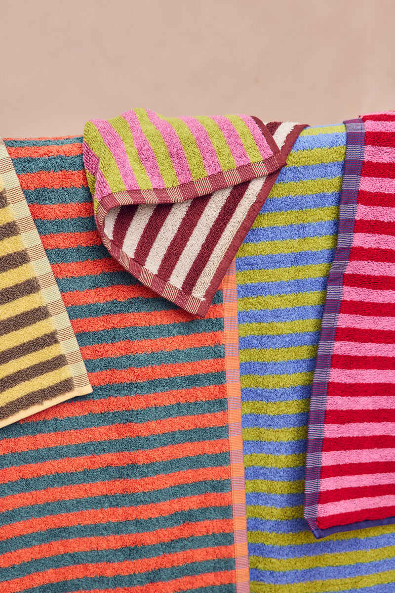 Bug stripe 2026 stripe towels on wooden rail