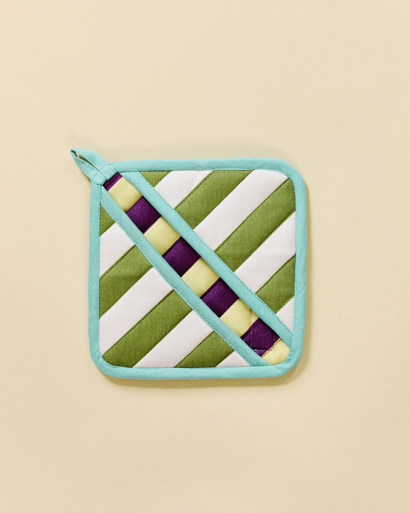 striped pot holder on a beige background 
